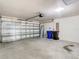 This garage features an automatic door and plenty of room for storage at 12222 Legacy Bright St, Riverview, FL 33578