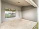 Covered patio with access to backyard, providing shade and a relaxing outdoor space at 12222 Legacy Bright St, Riverview, FL 33578