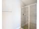 This bathroom features a glass shower with light tile and chrome fixtures at 12222 Legacy Bright St, Riverview, FL 33578