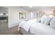 Stylish main bedroom offering a large window, and neutral decor at 13330 88Th Pl, Seminole, FL 33776