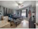 Cozy bedroom with a ceiling fan, comfortable bed, and stylish decor at 1773 Ezelle Ave, Largo, FL 33770