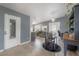 Dining area with tiled floors, a modern table set, and adjoining kitchen space at 1773 Ezelle Ave, Largo, FL 33770