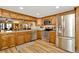 Modern kitchen featuring stainless steel appliances, granite countertops, and ample cabinet space at 1801 E Lake Rd # 11A, Palm Harbor, FL 34685