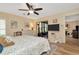 Main bedroom with en-suite bathroom and sliding glass doors to screened area at 1801 E Lake Rd # 11A, Palm Harbor, FL 34685