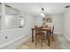 Bright dining room featuring a table with a large rug at 1902 Sweet Bay Ct, Plant City, FL 33566