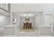 Bright dining room with a simple table and a large rug at 1902 Sweet Bay Ct, Plant City, FL 33566