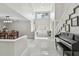 Bright foyer with high ceilings, stylish decor, and views to the dining area and staircase at 1902 Sweet Bay Ct, Plant City, FL 33566