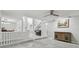 Bright living room boasting tile floors, ceiling fan and open staircase with piano at 1902 Sweet Bay Ct, Plant City, FL 33566