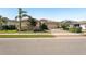 Charming home boasting well-maintained landscaping and a brick driveway leading to a spacious two-car garage at 20237 Bandera Pl, Venice, FL 34293