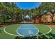 Outdoor basketball court on a sunny day, with a basketball hoop at 2171 Portofino Place # 27-2725, Palm Harbor, FL 34682
