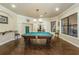 Charming billiard room with a pool table, seating, and views to the exterior at 2171 Portofino Place # 27-2725, Palm Harbor, FL 34682