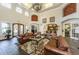 Amenity Center lounge area featuring comfortable leather seating and decor at 2171 Portofino Place # 27-2725, Palm Harbor, FL 34682