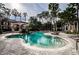 Beautiful community pool area, perfect for relaxation and enjoying the lush surroundings at 2171 Portofino Place # 27-2725, Palm Harbor, FL 34682