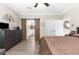 Bedroom displaying barn door access to an ensuite bathroom, and a well-organized layout at 21826 Pineywood Loop, Land O Lakes, FL 34639