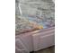 Close-up of the granite countertop featuring a reflective rainbow of light, and clean white cabinets at 21826 Pineywood Loop, Land O Lakes, FL 34639