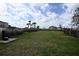 Community dog park with green space, drinking fountain and perimeter fence at 2411 Paravane Way, Wesley Chapel, FL 33543