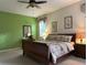 Cozy main bedroom features ceiling fan and neutral décor at 3205 Majestic View Dr, Lutz, FL 33558