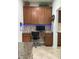 Office space with built-in desk, drawers, and upper cabinets at 3205 Majestic View Dr, Lutz, FL 33558