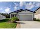 Attractive single Gathering home with well-maintained lawn and two car garage at 34747 Telluride Ln, Zephyrhills, FL 33541