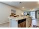 Modern kitchen boasts stainless steel appliances and granite countertops, perfect for cooking and entertaining at 34747 Telluride Ln, Zephyrhills, FL 33541