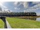 Enjoy serene backyard pond views, offering a relaxing escape into nature at 34747 Telluride Ln, Zephyrhills, FL 33541