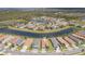 Panoramic aerial view of homes surrounding waterways offering a picturesque neighborhood setting at 4920 Sevilla Shores Dr, Wimauma, FL 33598