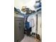 Walk-in closet featuring custom organization shelves and hanging rods for optimal storage at 4920 Sevilla Shores Dr, Wimauma, FL 33598