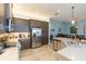Well-equipped kitchen featuring stainless steel appliances and plenty of cabinet space with modern design at 4920 Sevilla Shores Dr, Wimauma, FL 33598