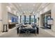 Inviting lounge area with comfortable seating, elegant decor, and a relaxing atmosphere at 4920 Sevilla Shores Dr, Wimauma, FL 33598