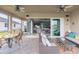 Covered patio with outdoor seating, providing seamless indoor-outdoor living at 4920 Sevilla Shores Dr, Wimauma, FL 33598