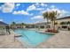 Resort-style swimming pool with ample seating, perfect for relaxation and recreation at 4920 Sevilla Shores Dr, Wimauma, FL 33598