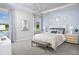 Serene bedroom with neutral tones, plenty of natural light, and sophisticated décor at 5020 124Th E Ave, Parrish, FL 34219
