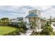 Community clubhouse featuring lush landscaping and welcoming entrance at 5020 124Th E Ave, Parrish, FL 34219