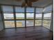 Enclosed lanai featuring views of the waterfront and surrounding landscape at 6315 Shoreline Dr # 3305, Madeira Beach, FL 33708