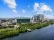 Aerial view showcasing waterfront community, featuring lush landscaping and modern buildings against a bright skyline at 700 S Harbour Island Blvd # 735, Tampa, FL 33602
