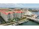 Stunning aerial view of a condo complex featuring a pool, boat docks, and waterfront views at 700 S Harbour Island Blvd # 735, Tampa, FL 33602