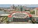 An aerial view shows a parking structure next to the water and downtown skyline at 700 S Harbour Island Blvd # 735, Tampa, FL 33602