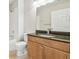 Bathroom with granite countertop vanity, toilet, and shower/tub combination at 700 S Harbour Island Blvd # 735, Tampa, FL 33602