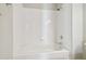 A clean white tiled bathtub and shower combo at 700 S Harbour Island Blvd # 735, Tampa, FL 33602