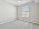 Well-lit bedroom with carpet floors and a window providing natural light at 700 S Harbour Island Blvd # 735, Tampa, FL 33602