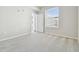 Bright bedroom with large window and doorway to outside patio at 700 S Harbour Island Blvd # 735, Tampa, FL 33602