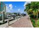 Picturesque waterfront view along the brick paved walkway with boats docked in slips at 700 S Harbour Island Blvd # 735, Tampa, FL 33602