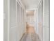 Hallway featuring multiple closets, leading to a full bathroom at 700 S Harbour Island Blvd # 735, Tampa, FL 33602