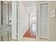 Hallway featuring wood floors and a shutter door closet at 700 S Harbour Island Blvd # 735, Tampa, FL 33602