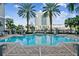 Refreshing swimming pool offers stunning city views, swaying palm trees, and a tranquil escape for relaxation and enjoyment at 700 S Harbour Island Blvd # 735, Tampa, FL 33602