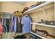 Functional walk-in closet with shelves and racks for organized storage solutions at 707 Old Mill Pond Rd, Palm Harbor, FL 34683