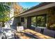 Outdoor dining area on the deck, with beautiful nature views and serene setting at 707 Old Mill Pond Rd, Palm Harbor, FL 34683