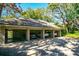 Three-car garage for parking and storage, providing ample space for vehicles and belongings at 707 Old Mill Pond Rd, Palm Harbor, FL 34683
