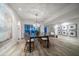 Bright dining area features modern decor and seamlessly connects to other living spaces at 741 Mandalay Ave, Clearwater Beach, FL 33767