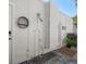 This outdoor shower features neutral decor and a beachy, relaxing atmosphere for rinsing off after visiting the nearby beach at 741 Mandalay Ave, Clearwater Beach, FL 33767